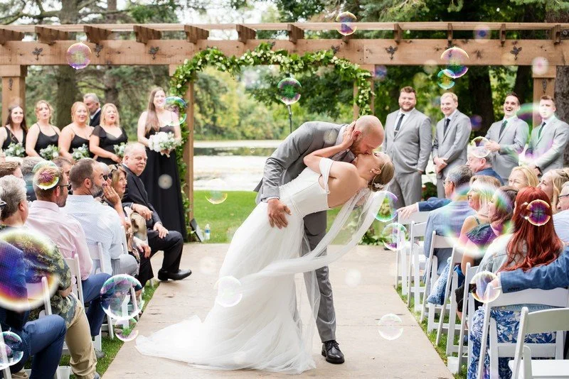 The outdoor ceremony space at Chart House in Lakeville, Minnesota on a clear summer day